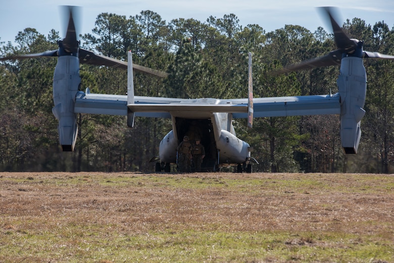 U.S. Marines board an MV-22 Osprey during Tactical Recovery of Aircraft and Personnel training at Camp Lejeune, North Carolina, Feb. 1, 2019. TRAP training enhances combat readiness and crisis response skills by preparing Marines to confidently enter potentially combative areas, tactically extract personnel, recover aircraft and retrieve or destroy sensitive material. The Marines are with the 24th Marine Expeditionary Unit.