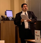Raul Guerra leads discussion of a case study during a pilot training workshop for cost realism analysis Jan. 23 at Redstone Arsenal, Alabama. Guerra is the cost-price functional manager for the Mission and Installation Contracting Command at Joint Base San Antonio-Fort Sam Houston.