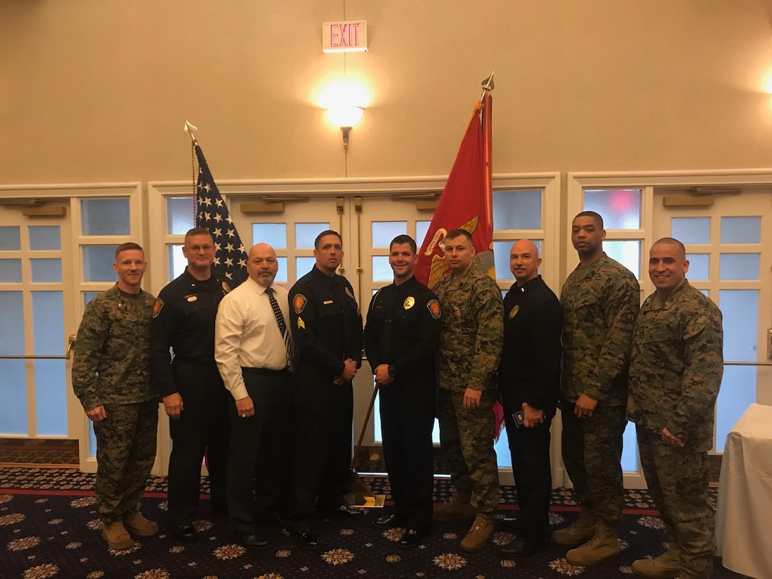 Pictured are the winners for 2018 MCB Quantico Civilian Awards. Security Battalions own Services Officer, Mr. Keith Simas Senior Civilian of the Quarter,  Sgt John Hughes Junior Civilian of the Year, Officer Drew Weston Junior Civilian of the Quarter.  To their flanks are Security Battalion leadership in support.