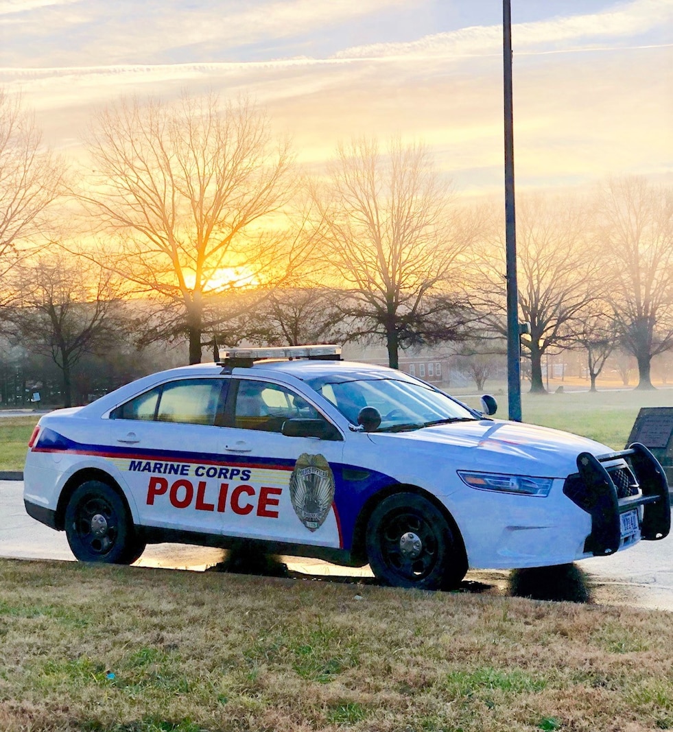 One of the Police cruisers that patrol Marine Corps Base Quantico parked in front of Lejeune Hall.
