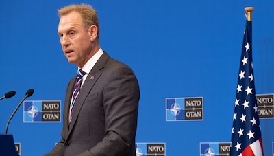 Acting Defense Secretary Patrick M. Shanahan answers questions during a news conference at the conclusion of the NATO defense ministerial conference in Brussels.