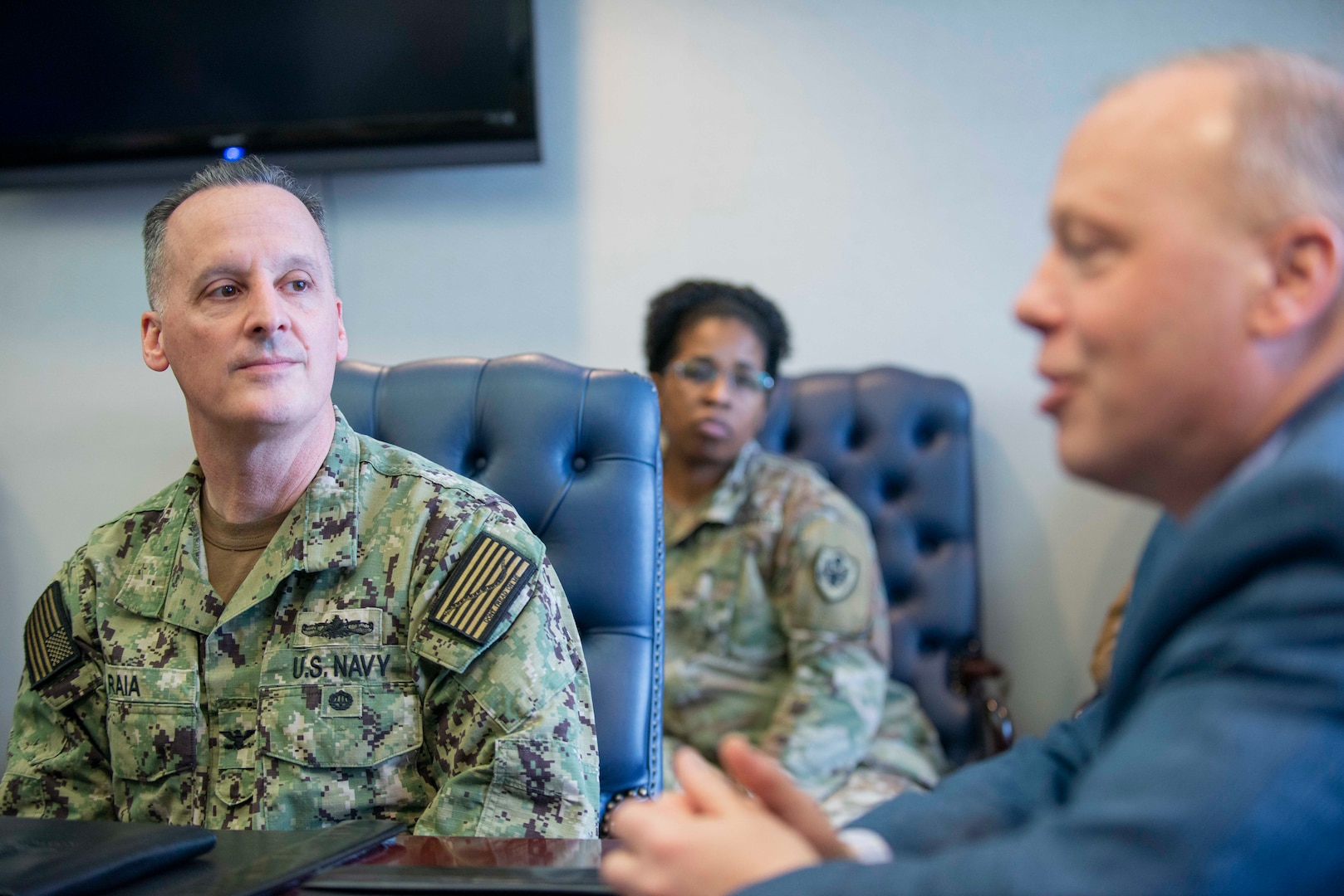 Navy Capt. Gerald Raia, Construction and Equipment director, listens to Jeffrey Beiler, the Corporal Michael J. Crescenz Veterans Affairs Medical Center finance and operations acting associate director, at the CMCVAMC, Feb. 11, 2019 in Philadelphia.
