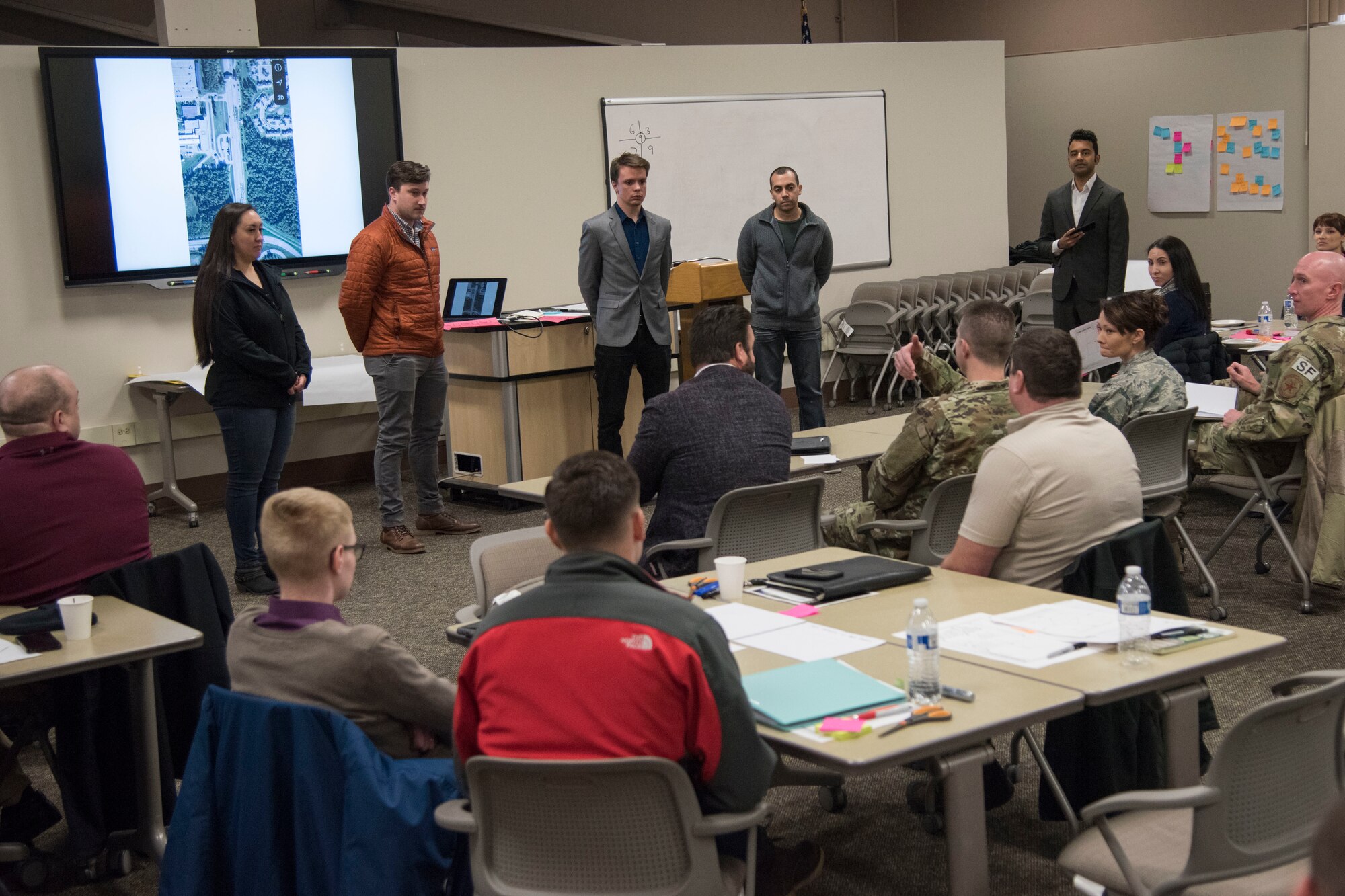 Teams present potential innovative solutions to the 673d Air Base Wing commander and leadership panel during an MD5 Boot Camp at Joint Base Elmendorf-Richardson, Alaska, Feb. 7, 2019. The intensive workshop hosted by the 673d Air Base Wing gave 40 innovators – service members and civilian employees from JBER and Eielson Air Force Base – an opportunity to focus on generating new ideas, nurturing talent and finding new applications of technology. Because of the course’s interactive lecture series and unique design, attendees were able to strategize viable solutions addressing one of the commander’s top priorities in less than four days.