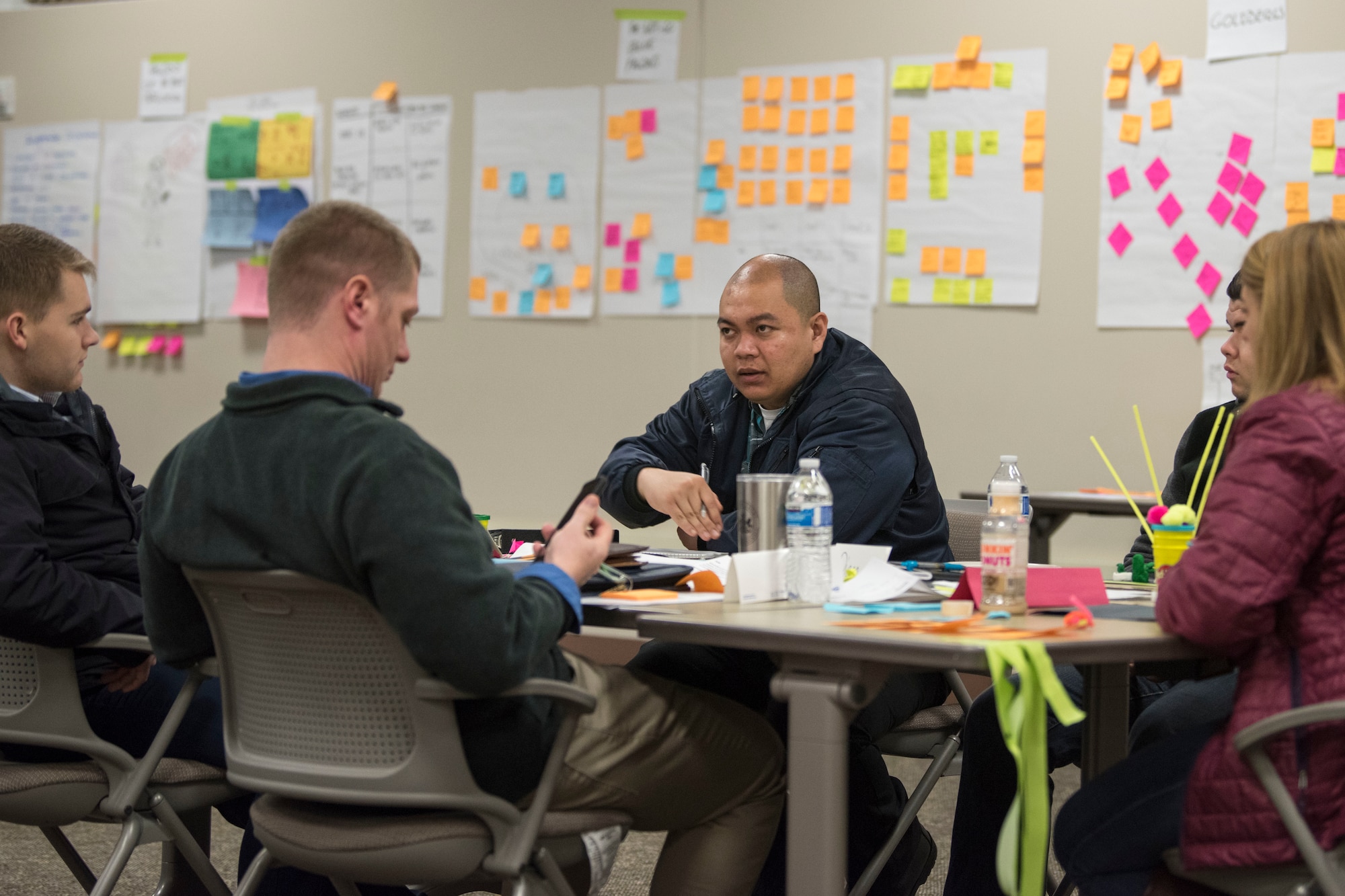 Participants work together using methods and processes learned during an MD5 Boot Camp at Joint Base Elmendorf-Richardson, Alaska, Feb. 7, 2019. The intensive workshop hosted by the 673d Air Base Wing gave 40 innovators – service members and civilian employees from JBER and Eielson Air Force Base – an opportunity to focus on generating new ideas, nurturing talent and finding new applications of technology.