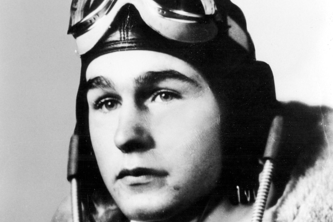 An official photo of a young George H.W. Bush in flight gear