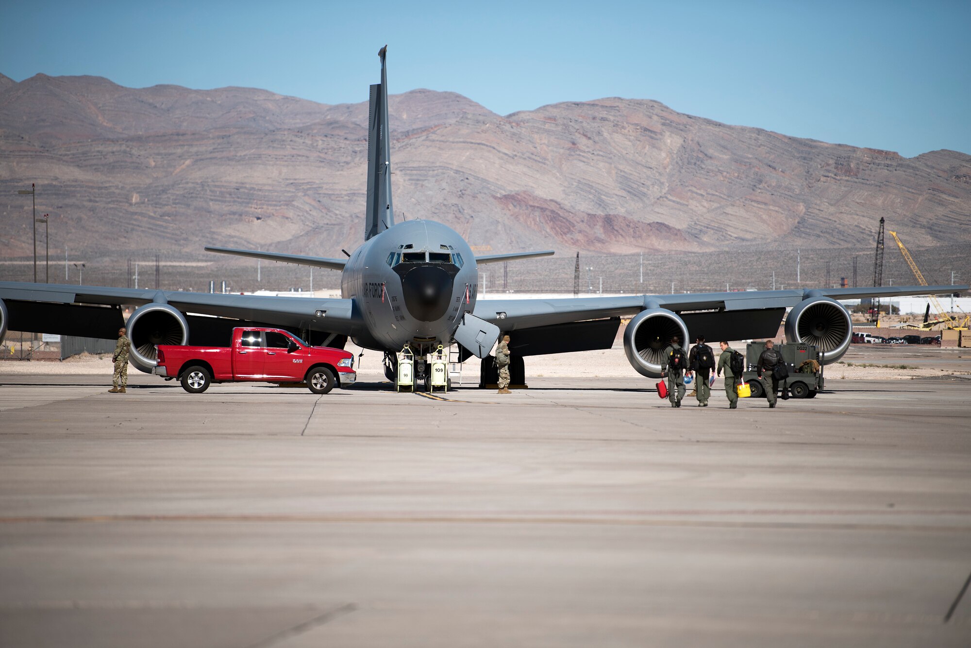 A U.S. Air Force KC-135 Stratotanker aircrew assigned to MacDill Air Force Base, Fla., walk to their aircraft in preparation for an aerial refueling mission during exercise Red Flag 19-1 at Nellis AFB, Nev., Feb. 7, 2019. More than 2,900 personnel from the U.S. Air Force, U.S. Navy, Royal Air Force and Royal Australian Air Force are participating in the realistic training exercise designed to enhance combat readiness and survivability. (U.S. Air Force photo by Senior Airman Ashley Perdue)