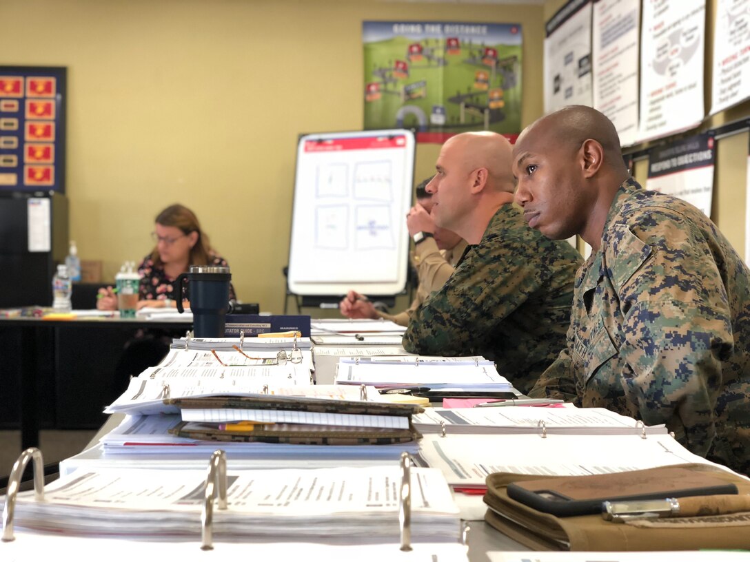 From the top down, the staff of Recruiters School is constantly working towards updating and enhancing the product delivered through each seminar. Here we see GySgt Smith and GySgt Polt providing valuable input for the Consultative Selling Skills seminar.