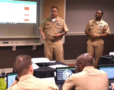 Chief Petty Officer Christian Torres (left), an accessor instructor assigned to Navy Recruiting Command’s National Training and Quality Assurance Team, joined by Chief Petty Officer Kevin Jones of Chicago, a trainer assigned to Navy Recruiting District San Antonio, provides instruction on building a targeted prospecting plan to recruiters of NRD’s and Navy Talent Acquisition Groups during a Leading Petty Officers (LPO) Course held at the Double Tree Hotel.