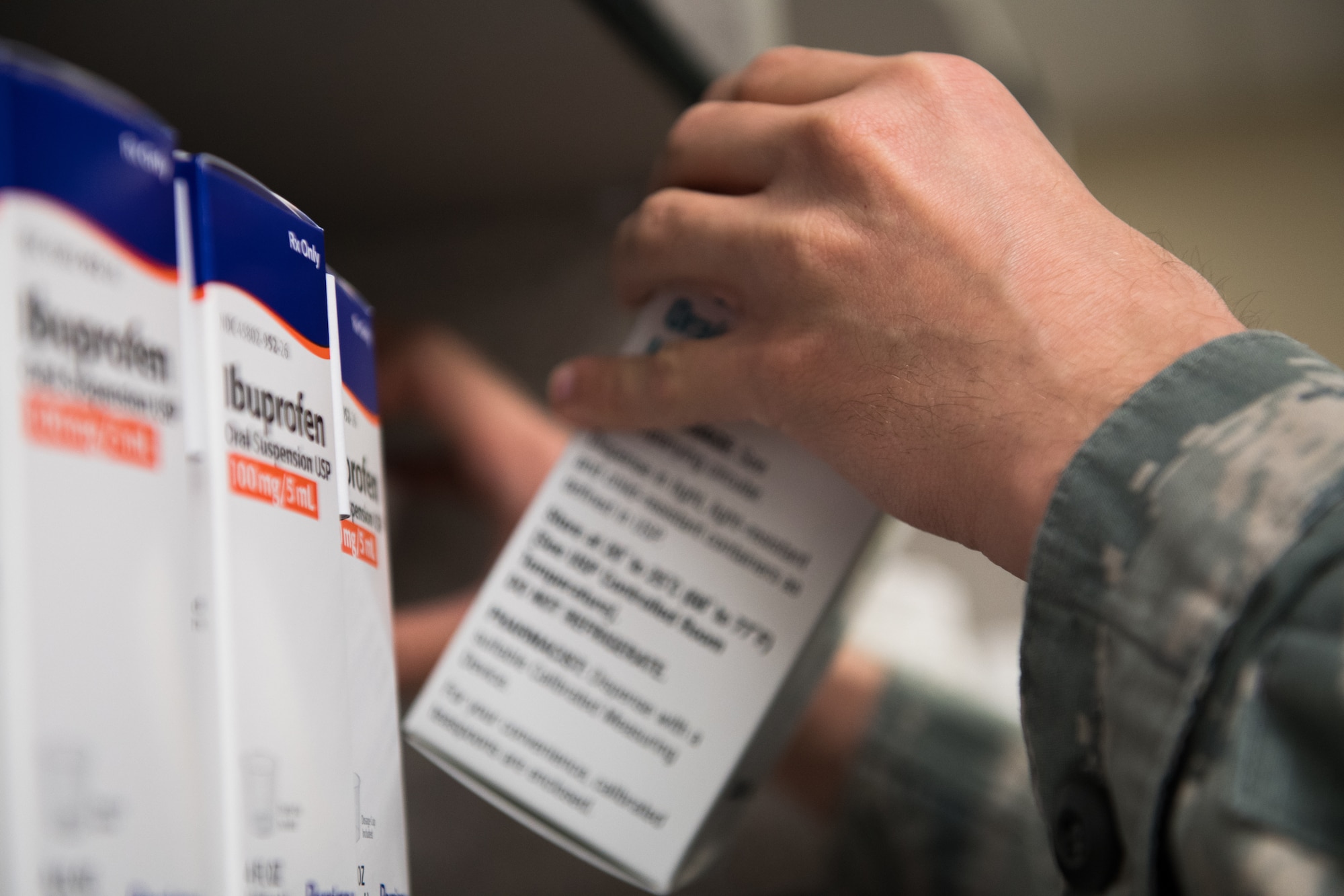 Second Lieutenant Samuel Wozinski, 2nd Medical Group Satellite Pharmacy volunteer, stocks the pharmacy shelves at Barksdale Air Force Base, La., Feb. 5, 2019. Volunteers handle straightforward tasks such as handing out prescriptions to customers and stocking shelves which allows the pharmacy staff more time to safely process prescriptions. (U.S. Air Force photo by Senior Airman Cassandra Johnson)