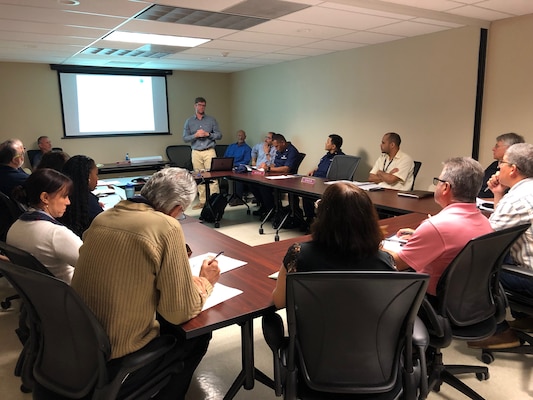 Local and federal agencies representatives listen to a presentation during a Corps of Engineers' regulatory program monthly meeting, held in San Juan Puerto Rico Feb. 6, 2019. The Corps host the meetings in order to assist applicants navigate the permitting process. The ultimate goal of each permitting action is to prevent aquatic resources from being negatively impacted by the proposed projects.