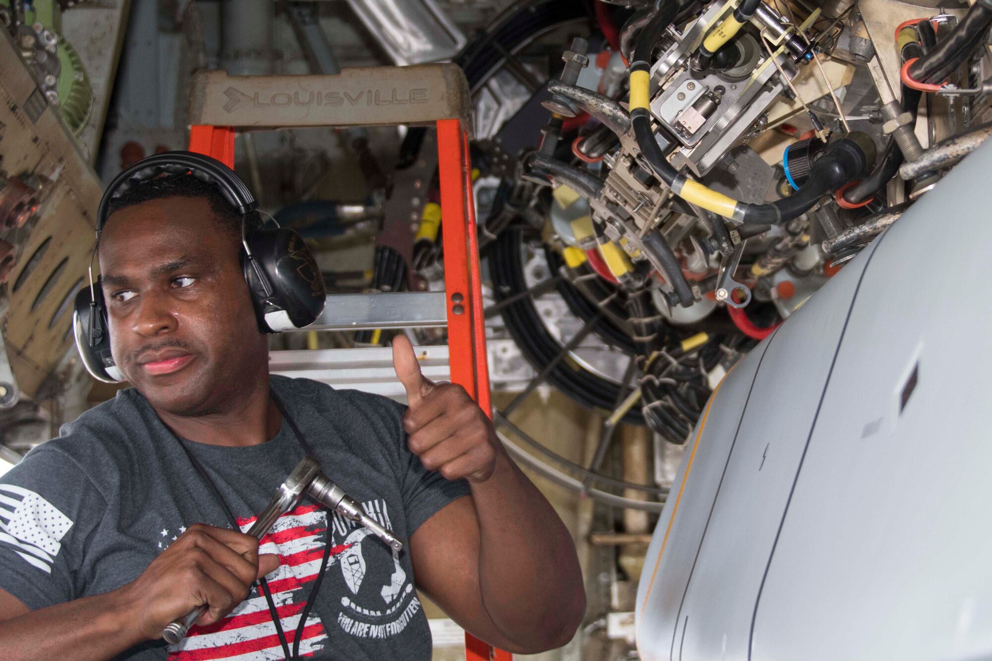 Charles Wilson, Jr., an Air Reserve Technician assigned to the 307th Aircraft Maintenance Squadron, gives the thumbs up sign at Barksdale Air Force Base, Louisiana, Feb. 6, 2019.  Wilson, along with other Reserve Citizen Airmen, was preparing the Conventional Rotary Launcher for a test to see if the weapons system could provide power to eight munitions at once. (U.S. Air Force photo by Master Sgt. Ted Daigle)