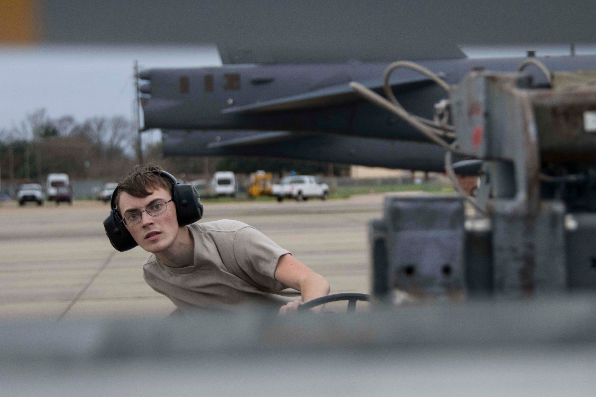 U.S. Air Force Airman 1st Class Japheth Wyatt, 2nd Aircraft Maintenance Squadron weapons loader, guides an AGM-158 Joint Air-to-Surface Standoff Missile onto a B-52 Stratofortress at Barksdale Air Force Base, Louisiana, Feb. 6, 2019.  The JASSM’s were placed on a Conventional Rotary Launcher to test its ability to provide power to eight munitions at once.  (U.S. Air Force photo by Master Sgt. Ted Daigle)