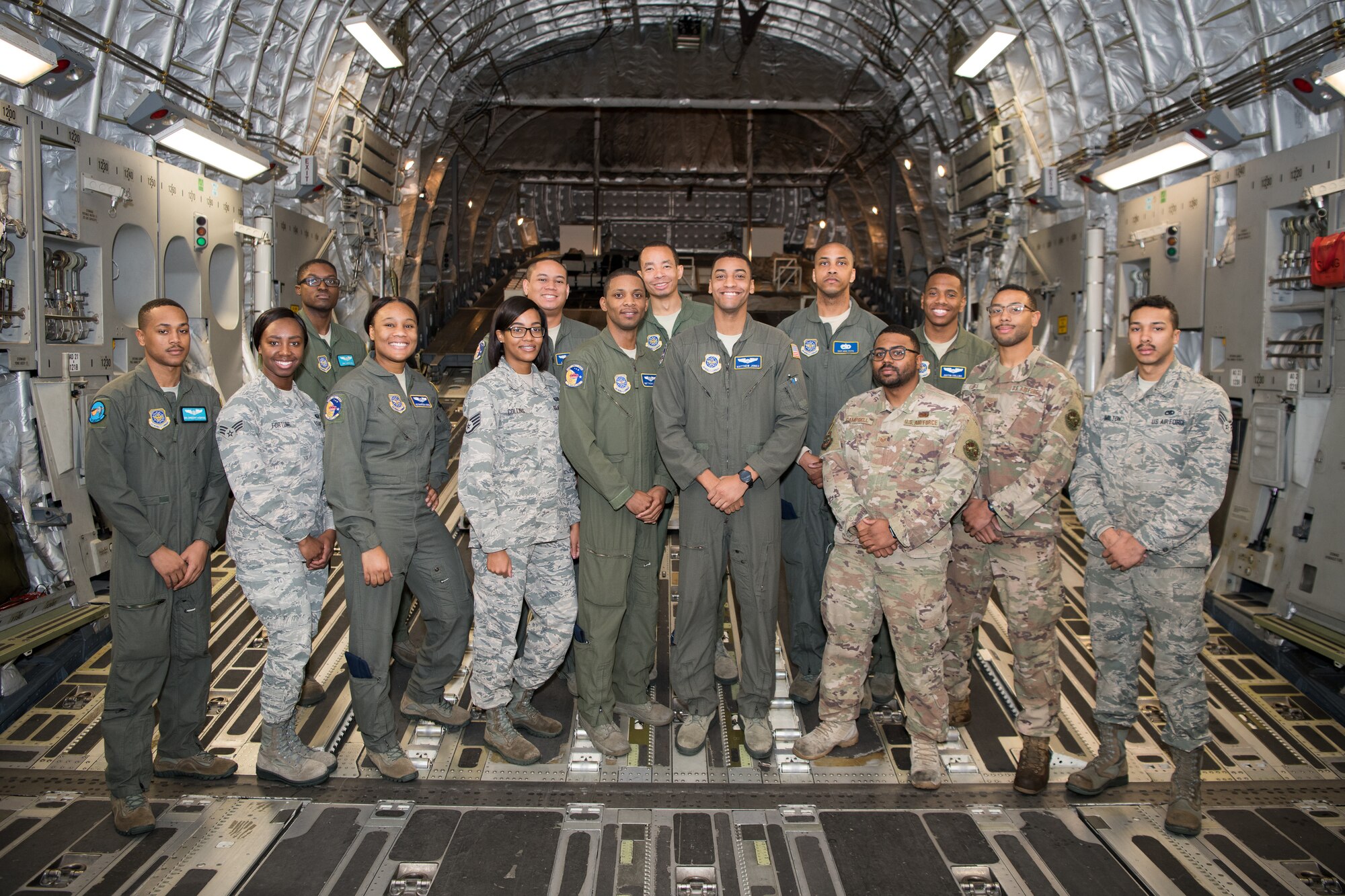 Airmen of the 3rd and 9th Airlift Squadrons who made up the flight crew for the African-American Heritage Flight Feb. 12, 2019, at Dover Air Force Base, Delaware. The flight was aimed at supporting the U.S. Air Force initiative to increase diversity and celebrate African-American History Month. (U.S. Air Force photo by Mauricio Campino)