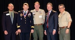 U.S. Army North Commanding General, Lt. Gen. Jeffrey Buchanan (second from left) was presented the Distinguished Eagle Scout Award at the Boy Scouts of America, Alamo Area Council Brunch Feb. 13 in San Antonio. Buchanan, who attained the rank of Eagle Scout in 1973, was presented this award for exceptionally distinguished service in his military career and to the community. Only one in every 1,000 Eagle Scouts has been awarded this high honor. Pictured (from left to right) are Mike Crownover, National Eagle Scout Association Chairman; Lt. Gen. Jeffrey Buchanan; Jim Lynch, Alamo Area Council Commissioner; Jim Jeffrey, Alamo Area Council President; and Michael de los Santos, Alamo Area Council Scout Executive.