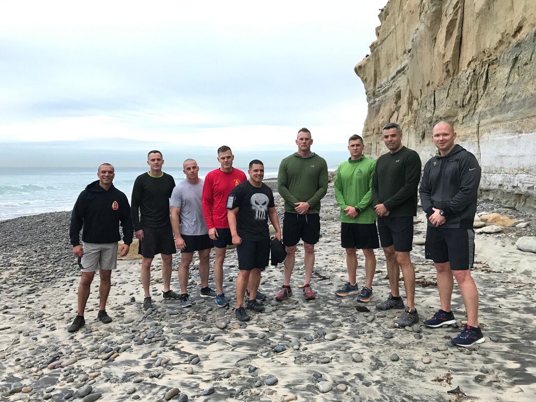 "The Recruiting Station Commanders of "Force 12" run the beach trails of Torrey Pines, California, as part of the District Commander's Operations & Training Symposium held 13 Feb 2019."