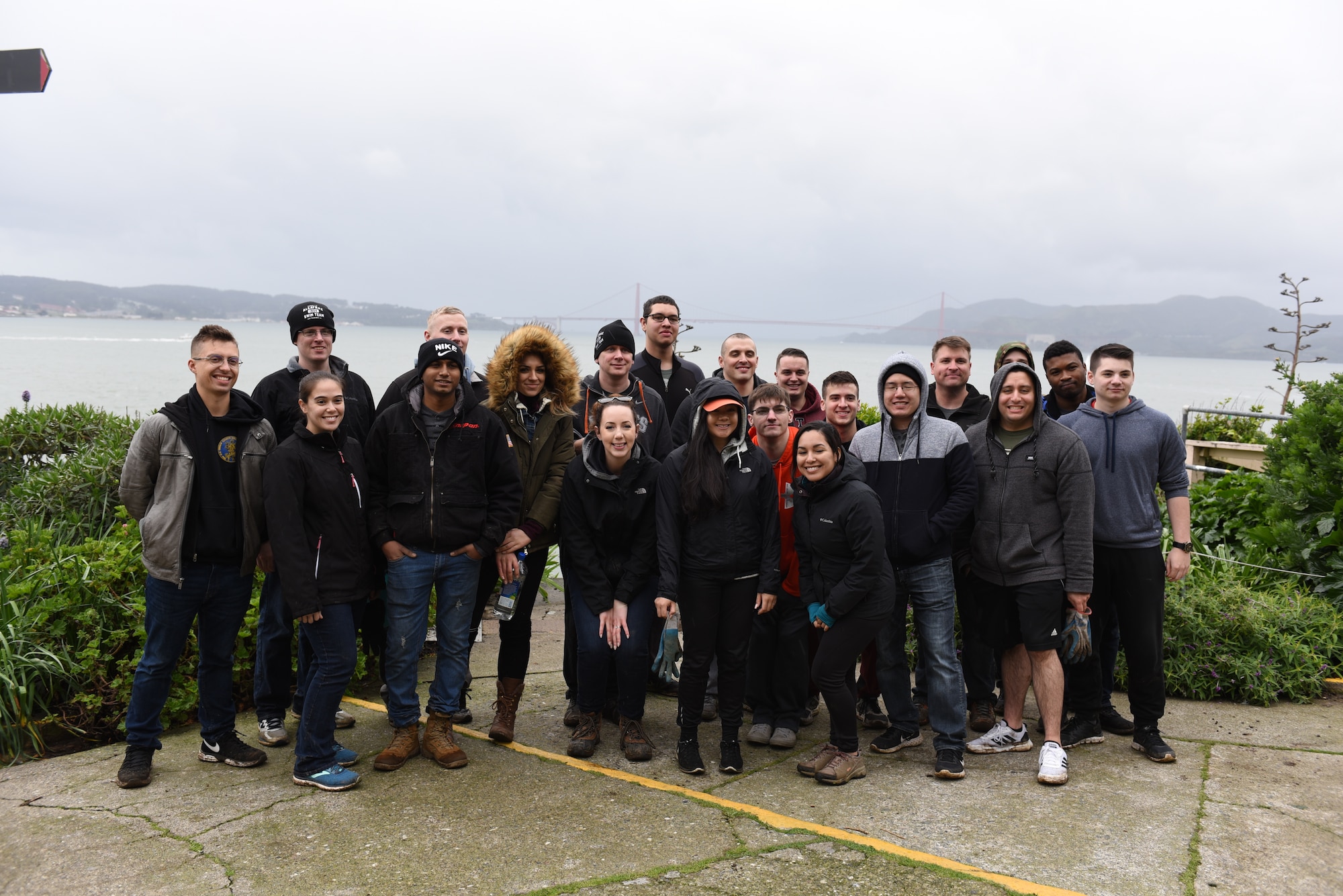 U.S. Air Force Airmen, 60th Operations Support Squadron, pose for a group picture 12 p.m. Feb. 9, 2019, in San Francisco. This group of Airmen participated in a vollunteer clean up to help out thier local community. (U.S. Air Force photo by Airman 1st Class Otte)