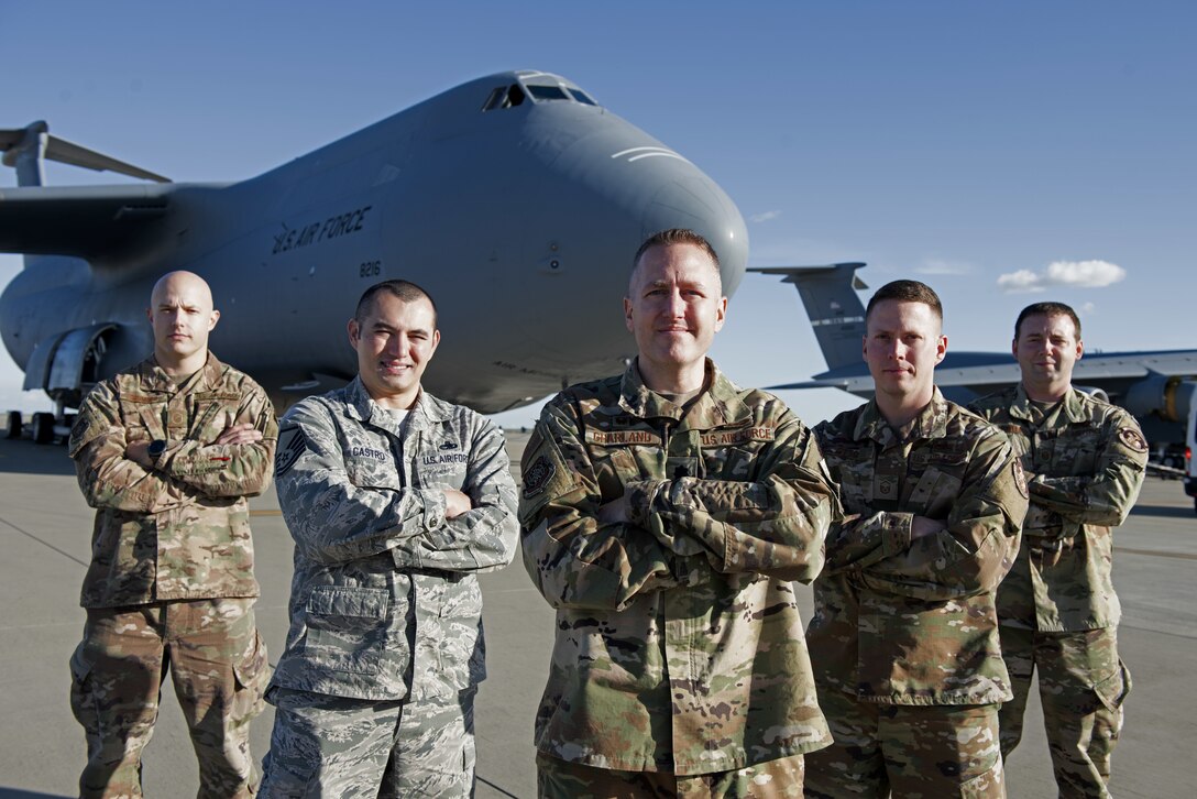 U.S. Air Force Lt. Col. Gary Charland Jr., center, 60th Aircraft Maintenance commander, poses for a photo with senior non-commissioned officers from the 60th AMXS Feb. 6, 2019, in front of a C-5M Super Galaxy at Travis Air Force Base, Calif. Charland was awarded the Lieutenant General Leo Marquez field grade manager category award for aircraft maintenance. (U.S. Air Force photo by Airman 1st Class Jonathon Carnell)