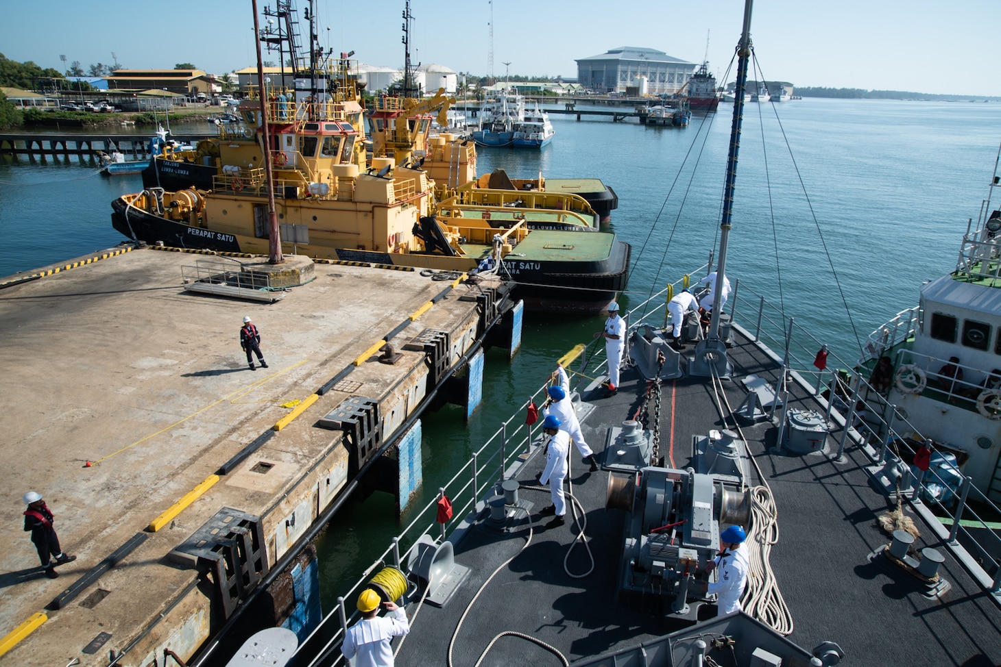 MUARA, Brunei (Feb. 15, 2019) the Avenger-class mine countermeasures ship USS Chief (MCM 14) arrives at Muara Naval Base. Chief is visiting Brunei while operating in U.S. 7th Fleet to strengthen regional security and stability, and enhance interoperability with partners.