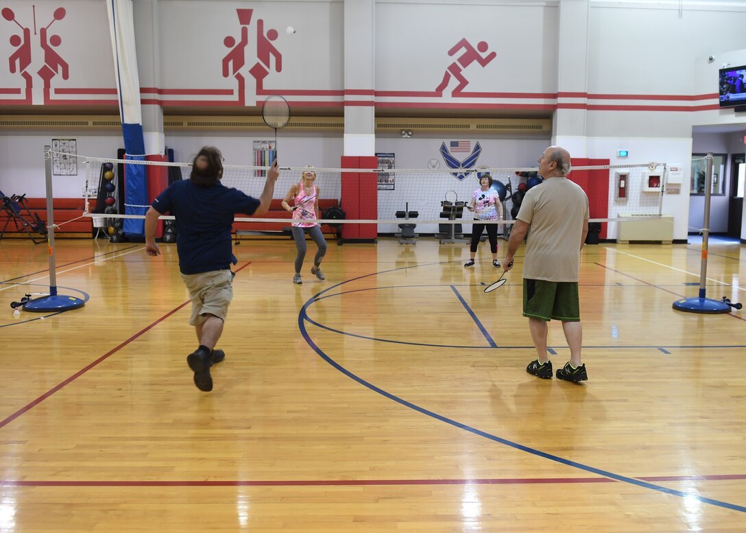 Debbie Vasko, marketing assistant with the 911th Force Sustainment Squadron, and Arlene Lewandowski compete in a badminton tournament against Paul Czarnecki, senior network administrator with the 911th Communications Squadron and Alan Hill, recreation assistant with the 911th FSS at the Pittsburgh International Airport Air Reserve Station, Pennsylvania, Feb. 14, 2019. The badminton tournament is February’s special program put on by the 911th Airlift Wing Fitness Center for base personnel. (U.S. Air Force Photo by Senior Airman Grace Thomson)