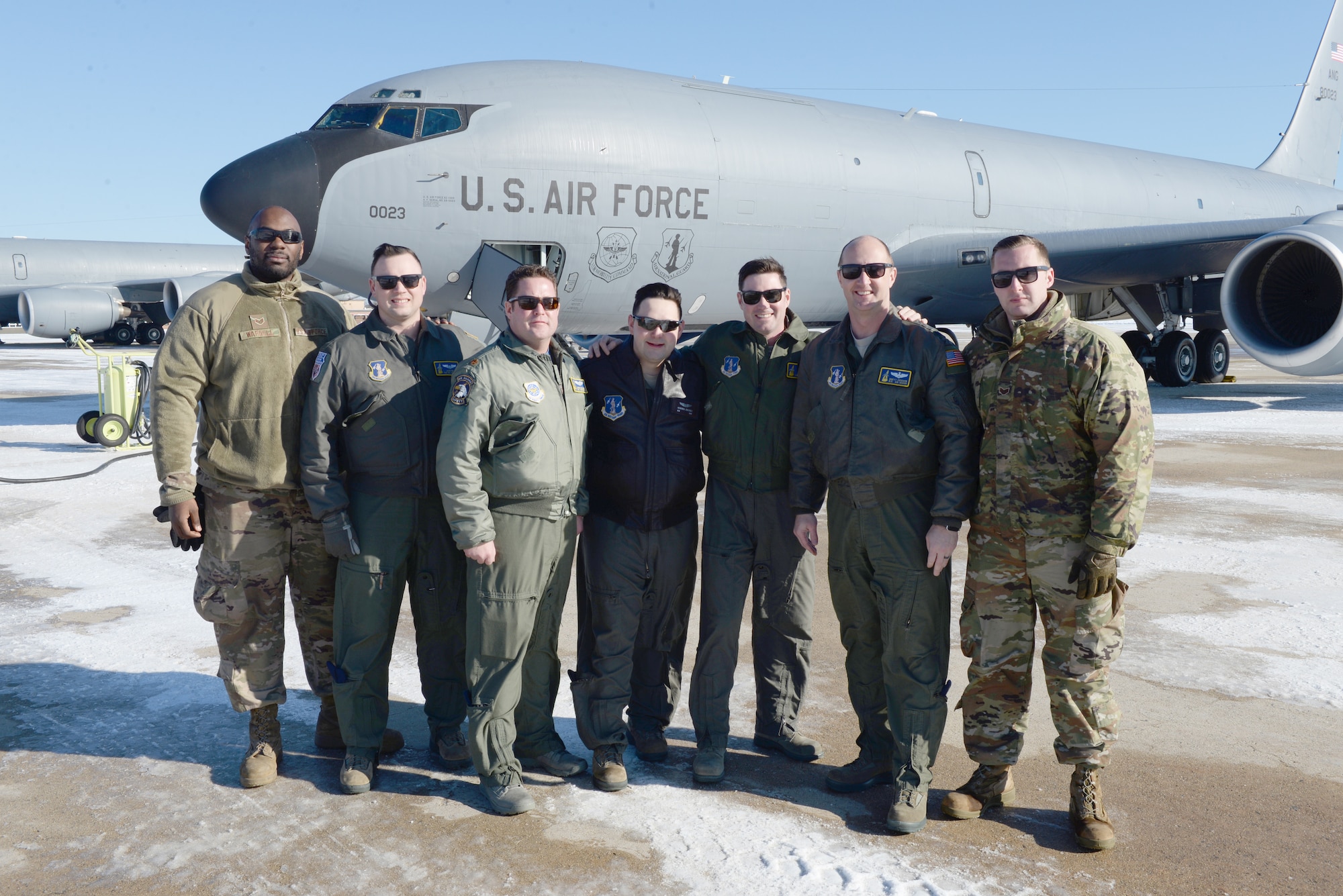 The Flight Crew of KC-135R Stratotanker, tail number 58-0023, from the 157th Air Refueling Wing, New Hampshire Air National Guard, pose for a group photo prior to flying the aircraft to the 151st ARW, Air National Guard Base, Utah, Jan. 30, 2019. From left, SSgt. Dennis Wardell, Tech. Sgt. Jason Inglis, Maj. Christopher Dillman, Staff Sgt. Kendrick Guerrier, Tech. Sgt. Nate Tarleton, Tech. Sgt. Joe Hewitt. The aircraft is one of eight aircraft leaving the Wing during the unit’s divestiture of the KC-135. (U.S. Air National Guard photo by Staff Sgt. Curtis J. Lenz)