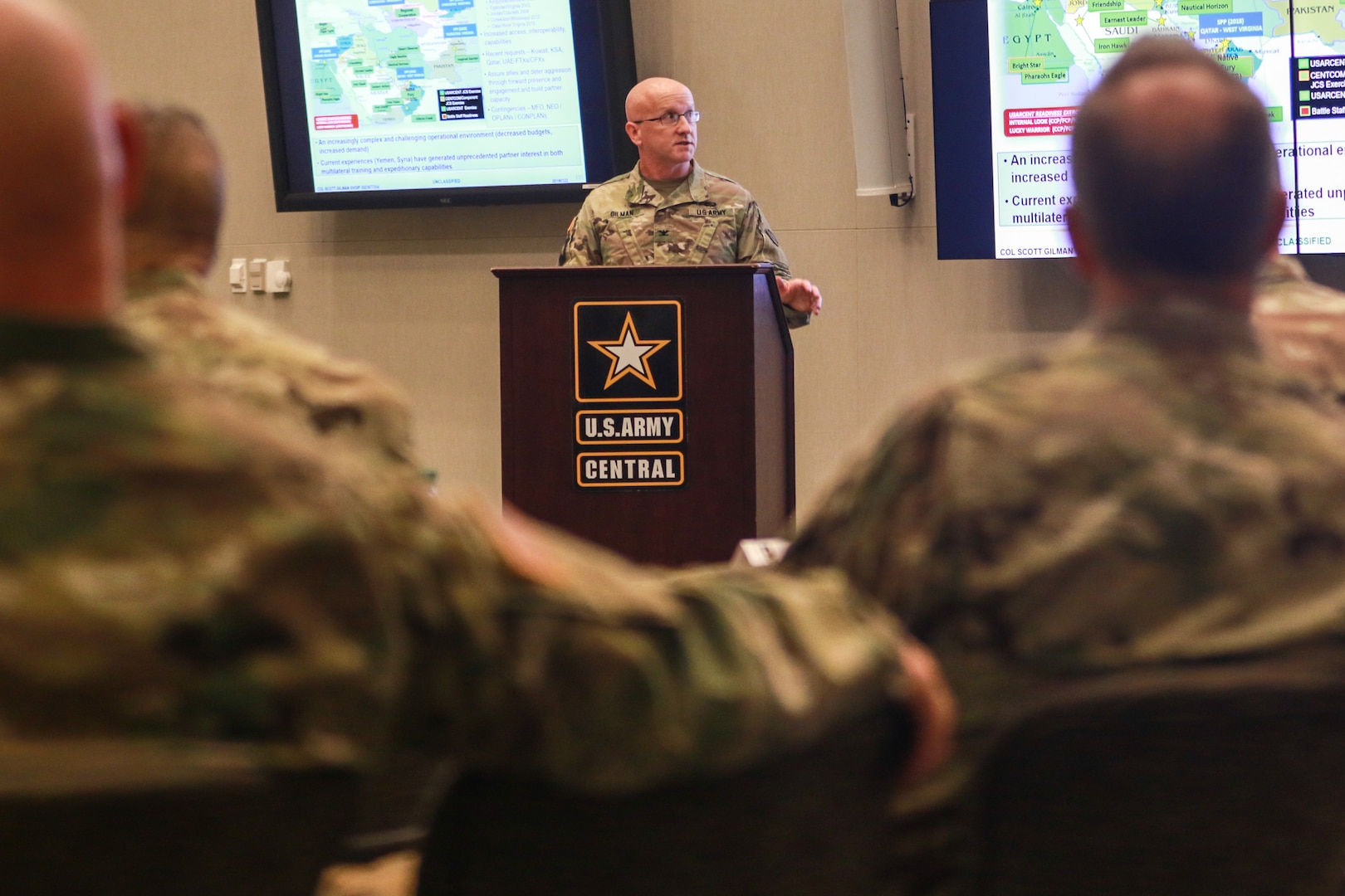 Col. Scott Gilman, the U.S. Army Central Training and Exercises division chief, briefs senior leaders from USARCENT, the U.S. Army Reserves and the U.S. Army National Guard during the Operation Spartan Shield Community of Excellence Forum at Patton Hall on Shaw Air Force Base, S.C., Feb. 6, 2019.