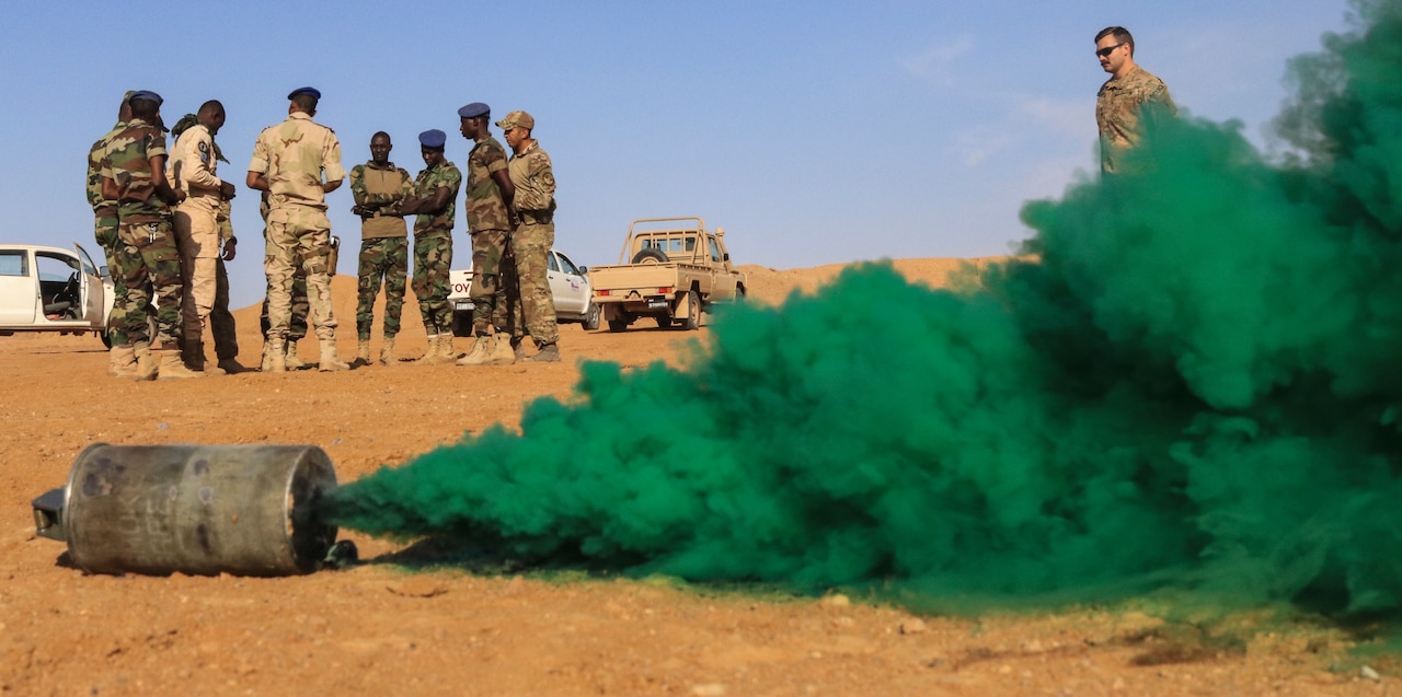 Tactical concealment is used with green smoke.