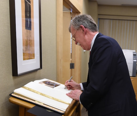Ambassador John Bolton, National Security Advisor, signs the commander’s guest book during his visit to USSTRATCOM at Offutt Air Force Base, Neb., Feb. 14, 2019. The Ambassador observed USSTRATCOM’s combat-ready force, engaged in discussions with senior leaders and thanked warfighters for their service to the nation. Bolton’s visit also highlighted USSTRATCOM’s critical role in the National Security Strategy. (U.S. Air Force photo by Master Sgt. April Wickes)
