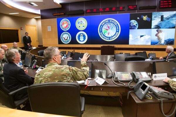 Ambassador John Bolton, National Security Advisor, receives a command and control update from Air Force Gen. John Hyten, commander of United States Strategic Command (USSTRATCOM), on the command’s Battle Deck during his trip to USSTRATCOM, Offutt Air Force Base, Neb., Feb. 14, 2019. The Ambassador observed USSTRATCOM’s combat-ready force, engaged in discussions with senior leaders and thanked warfighters for their service to the nation. Bolton’s visit also highlighted USSTRATCOM’s critical role in the National Security Strategy. (U.S. Navy photo by Mass Communications Specialist Julie Matyascik)