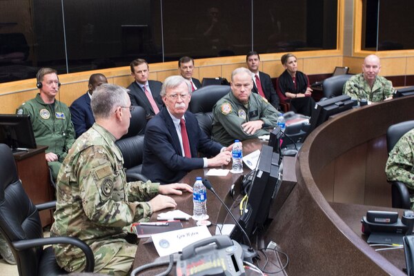 Ambassador John Bolton, National Security Advisor, receives a command and control update from Air Force Gen. John Hyten, commander of United States Strategic Command (USSTRATCOM), on the command’s Battle Deck during his trip to USSTRATCOM, Offutt Air Force Base, Neb., Feb. 14, 2019. The Ambassador observed USSTRATCOM’s combat-ready force, engaged in discussions with senior leaders and thanked warfighters for their service to the nation. Bolton’s visit also highlighted USSTRATCOM’s critical role in the National Security Strategy. (U.S. Navy photo by Mass Communications Specialist Julie Matyascik)