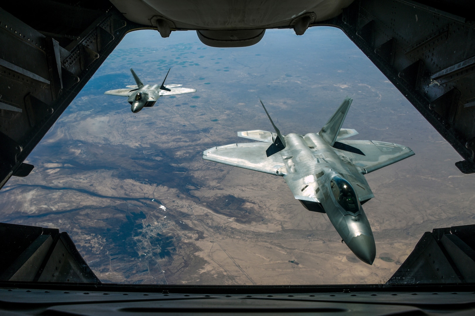 Two Air Force F-22 Raptors fly over Syria Feb. 2, 2018, while supporting Operation Inherent Resolve.