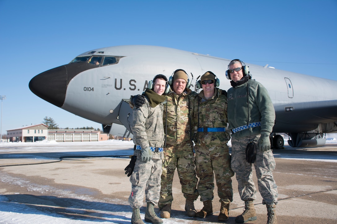 The Aircraft Maintenance Crew of a KC-135R Stratotanker, tail number 58-0104 from the 157th Air Refueling Wing, New Hampshire Air National Guard, pose for a group photo prior to flying the aircraft to the 126th ARW, Scott  Air Force Base, Illinois, Jan. 30, 2019. From left, Staff Sgt. Jared Karos, Master Sgt. John Bober, Staff Sgt. Joe Depalma, Tech. Sgt. William Waters. The aircraft is one of eight aircraft leaving the Wing during the unit’s divestiture of the KC-135. (U.S. Air National Guard photo by Tech. Sgt. Aaron P. Vezeau)