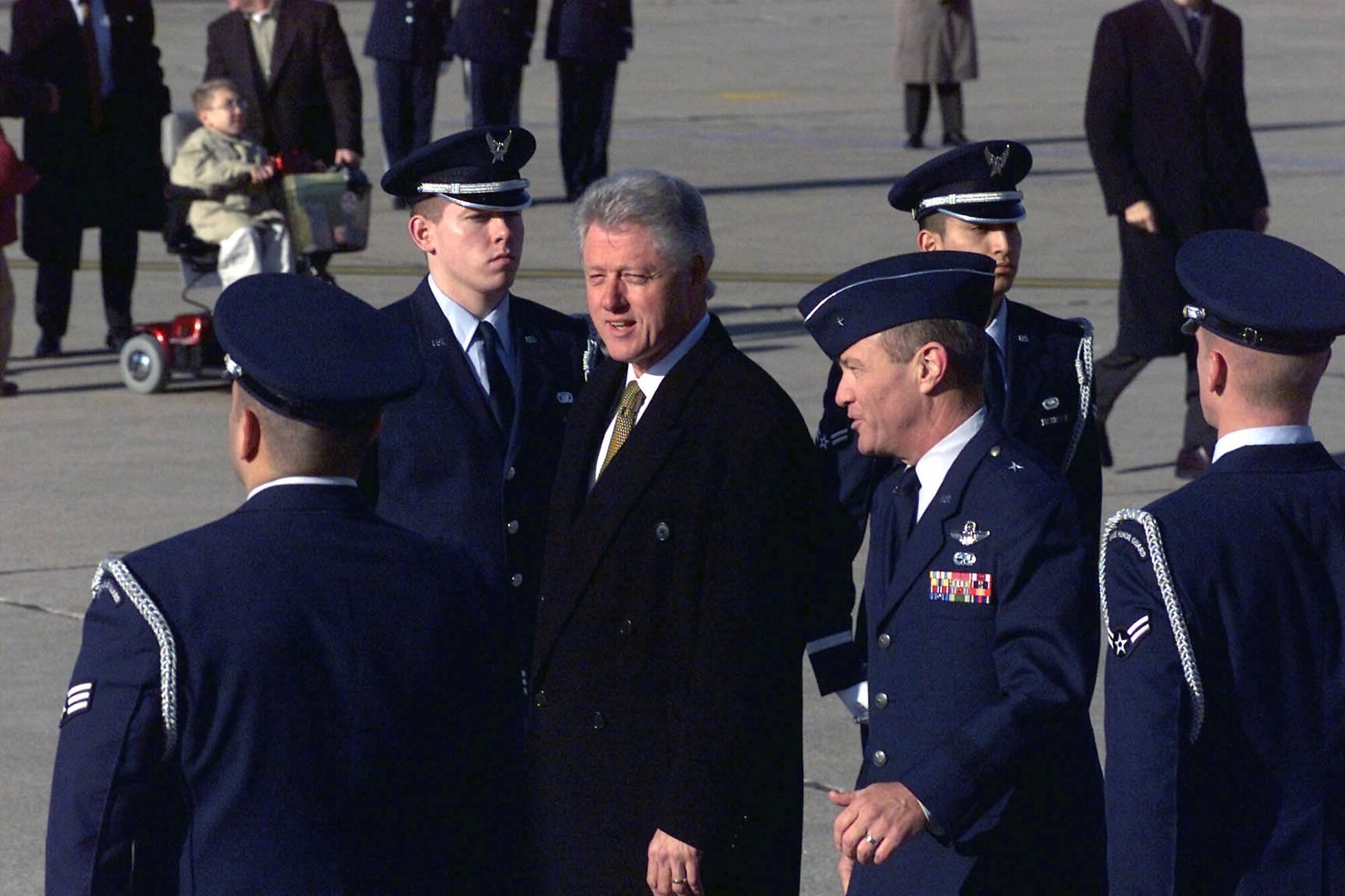 Former President of the United States, Williams Jefferson Clinton is escorted by Brig. Gen. Gregory H. Power, former 55th Wing commander at Offutt AFB, Nebraska upon his arrival on Dec. 8, 2000.