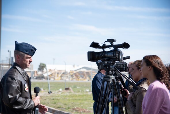 U.S. Air Force Col. Brian Laidlaw, 325th Fighter Wing commander, talks with reporters after the celebration of Bay County, Fla., being named a Great American Defense Community, at Tyndall Air Force Base, Feb. 13, 2019. Bay County, is one of five communities across the country to be named a Great American Defense Community in 2019. The GADC program leaders work to recognize military communities and regions that help improve the quality of life for veterans, service members and their families. (U.S. Air Force photo by Senior Airman Javier Alvarez)
