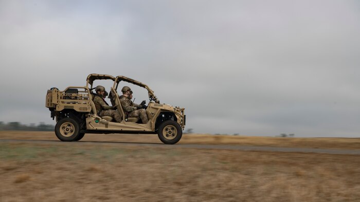 Airmen from the 621 Contingency Response Wing drive through the airfield in an all-terrain vehicle during Exercise Crescent Moon Feb. 12, 2019, at North Auxiliary Airfield in North, S.C.