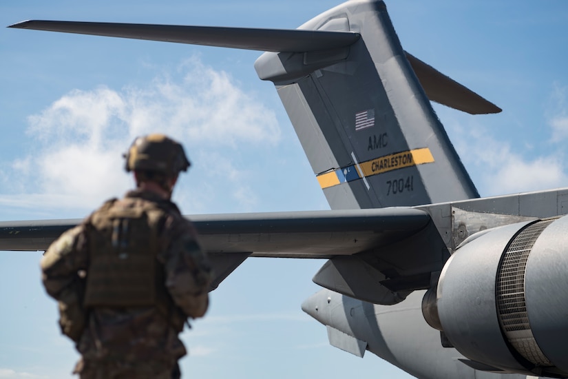 Capt. Eric Danko, 321st Contingency Response Squadron flight commander, looks at a C-17 Globemaster III during Exercise Crescent Moon Feb. 12, 2019, at North Auxiliary Airfield in North, S.C.