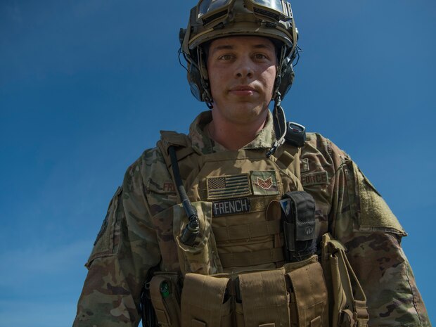 Staff Sgt. Cory French, 621st Contingency Response Squadron aerial porter, walks through the airfield during Exercise Crescent Moon Feb. 12, 2019, at North Auxiliary Airfield in North, S.C.