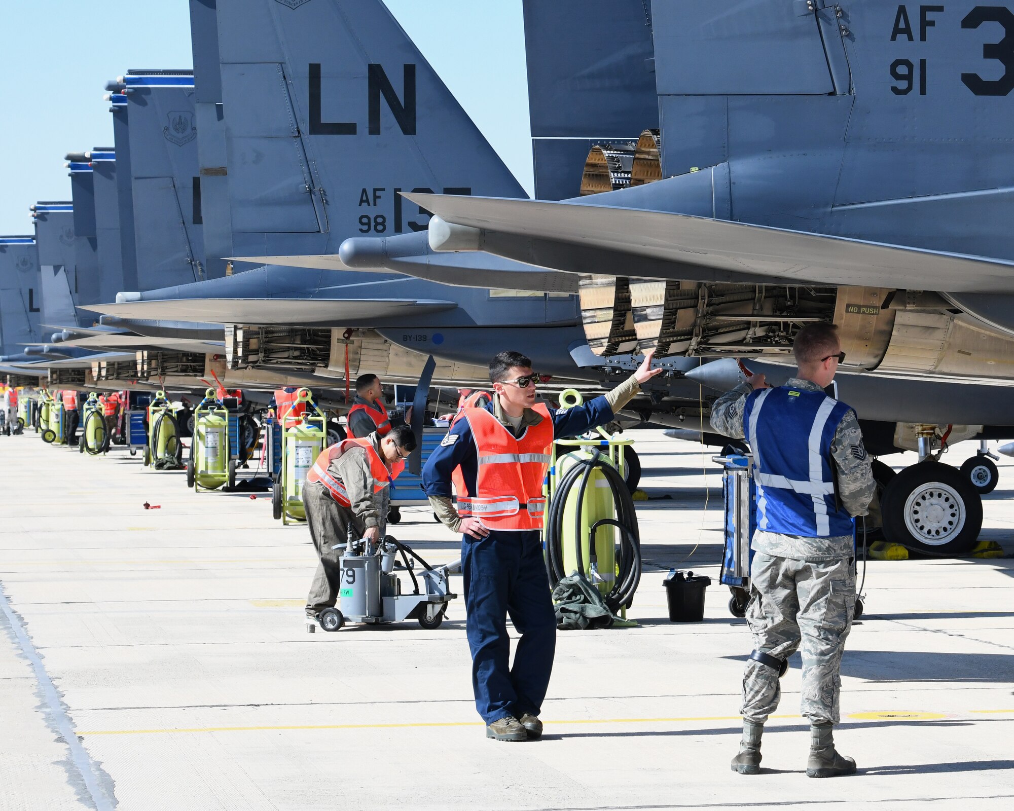 U.S. Air Force Airmen from Royal Air Force Lakenheath, England, inspect F-15E Strike Eagles that recently landed at Albacete Air Base, Spain, during the NATO Tactical Leadership Programme 19-1 flying course, Feb. 15, 2019. During TLP, U.S. Air Force F-15s will conduct flying training with other NATO air forces including Spain, France, Greece, Italy, Germany, the United Kingdom and Belgium. (U.S. Air Force photo by Staff Sgt. Alex Fox Echols III)