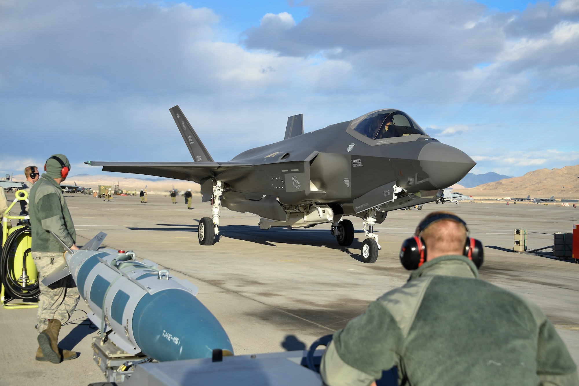Airmen prepare to load an F-35A prior to a sortie. Pilots and maintainers from the 388th Fighter Wing's 4th Fighter Squadron and 4th Aircraft Maintenance Unit are participating in Red Flag 19-1 at Nellis AFB, Nevada. This is the wing's second Red Flag with the F-35A, America's most advanced multi-role fighter, which brings game-changing stealth, lethality and interoperability to the modern battlefield. Red Flag is the Air Force's premier combat exercise and includes units from across the Air Force and allied nations. The 388th is the lead wing for Red Flag 19-1. (U.S. Air Force photo by R. Nial Bradshaw)