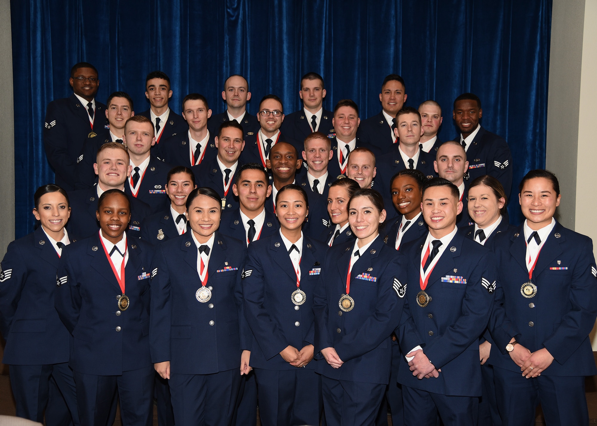 The graduating Airman Leadership School Class 19-C students pose for a photo in the Trail's End Event Center on F.E. Warren Air Force Base, Wyo., Feb. 13, 2019. Enlisted Airmen must complete the rigorous professional military education course before supervising other Airmen.