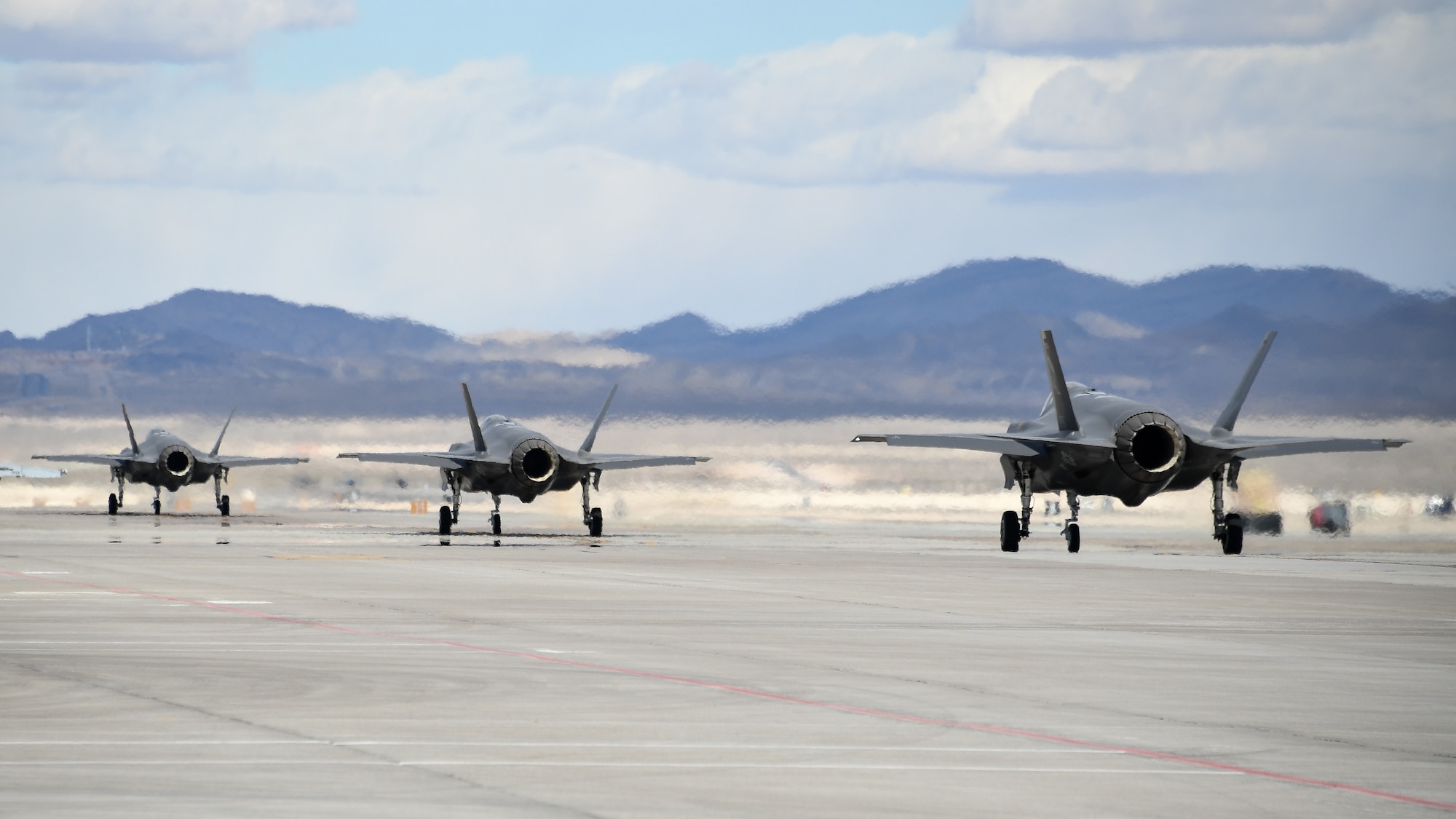 F-35A Lightning II fighter jets from Hill Air Force Base, Utah, taxi during Red Flag 19-1 at Nelllis Air Force Base, Nevada, Feb. 6, 2019. Pilots and maintainers from the 388th Fighter Wing and 419th Fighter Wing spent three weeks at Red Flag, the Air Force's premier combat exercise that includes units from across the Air Force and allied nations.