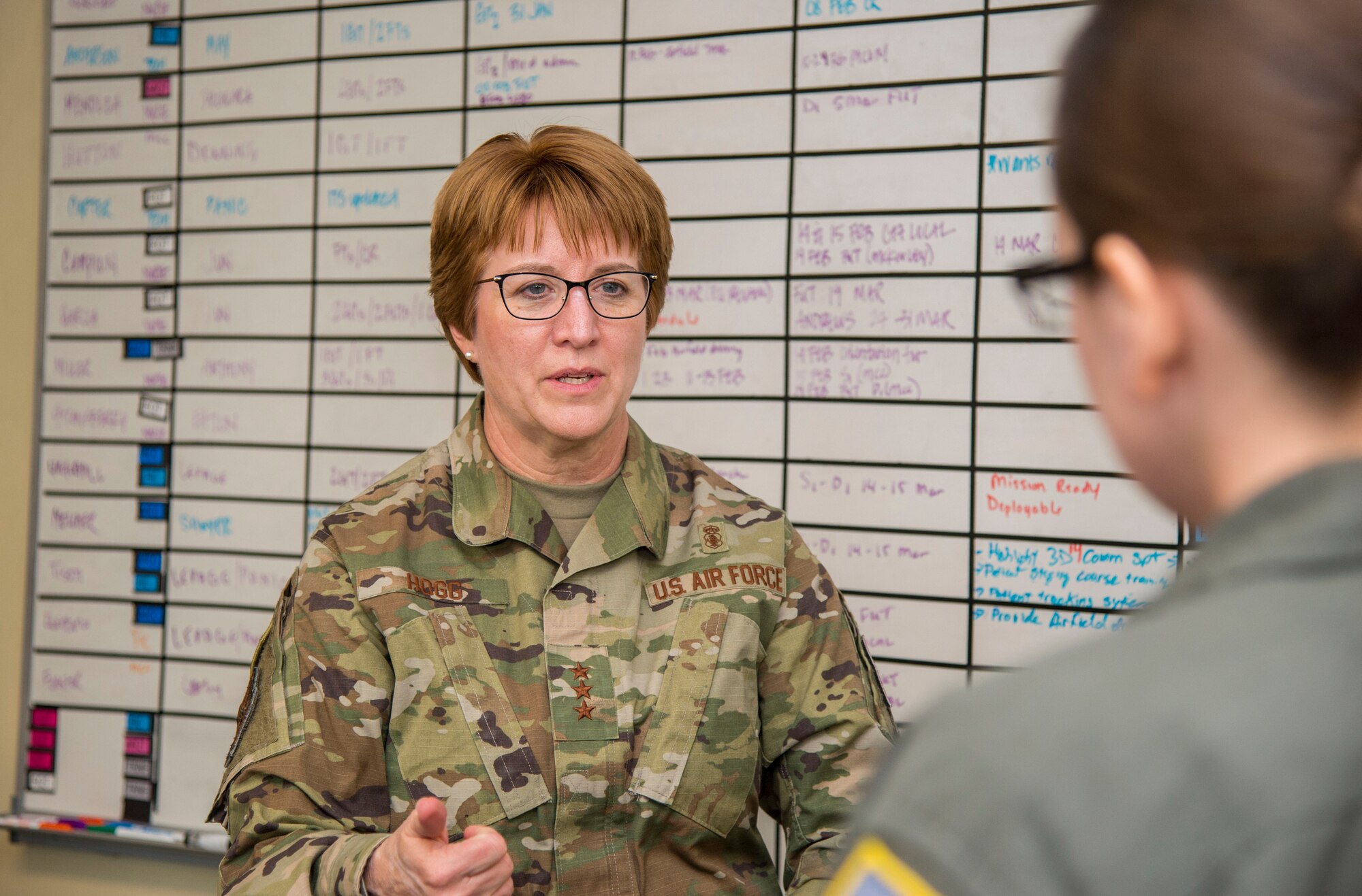 Lt. Gen. Dorothy Hogg, U.S. Air Force Surgeon General, speaks with Tech. Sgt. Christina May, 375th Aeromedical Evacuation Squadron aeromedical evacuation technician, during her tour of the 375th AES at Scott Air Force Base, Illinois, Feb. 13, 2019. Hogg and Chief Master Sgt. G. Steve Cum, Chief, Medical Enlisted Force and Enlisted Corps Chief, toured the medical facilities and spoke with Airmen during their three-day tour of the base. (U.S. Air Force photo by Airman 1st Class Nathaniel Hudson)