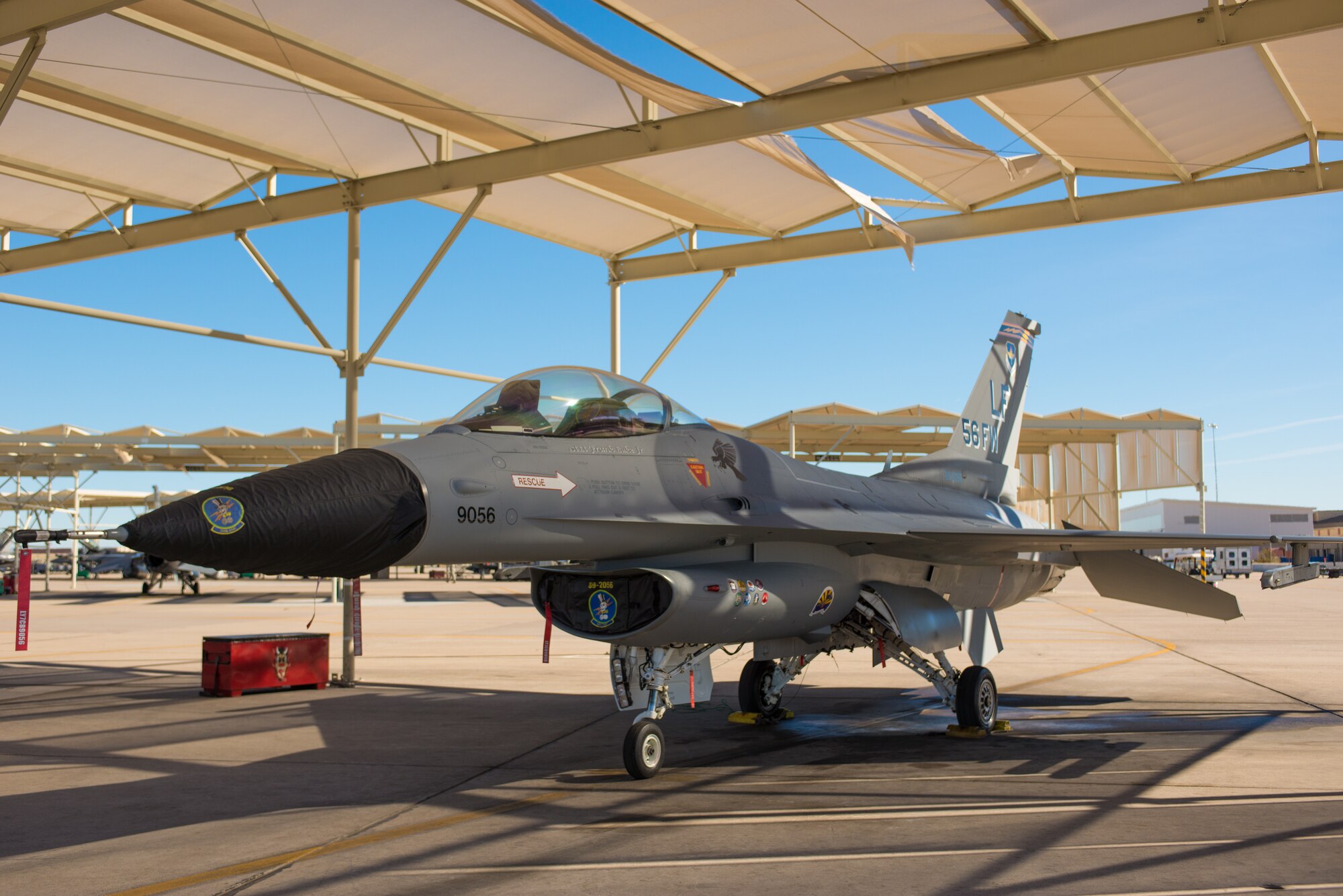 An F-16 Fighting Falcon with a completed vintage paint design sits on the runway at Luke Air Force Base, Ariz. The F-16 will promote the heritage and role the aircraft has played in the Air Force and the Airmen who fly and maintain it. (U.S. Air Force photo by Senior Airman Caleb Worpel)