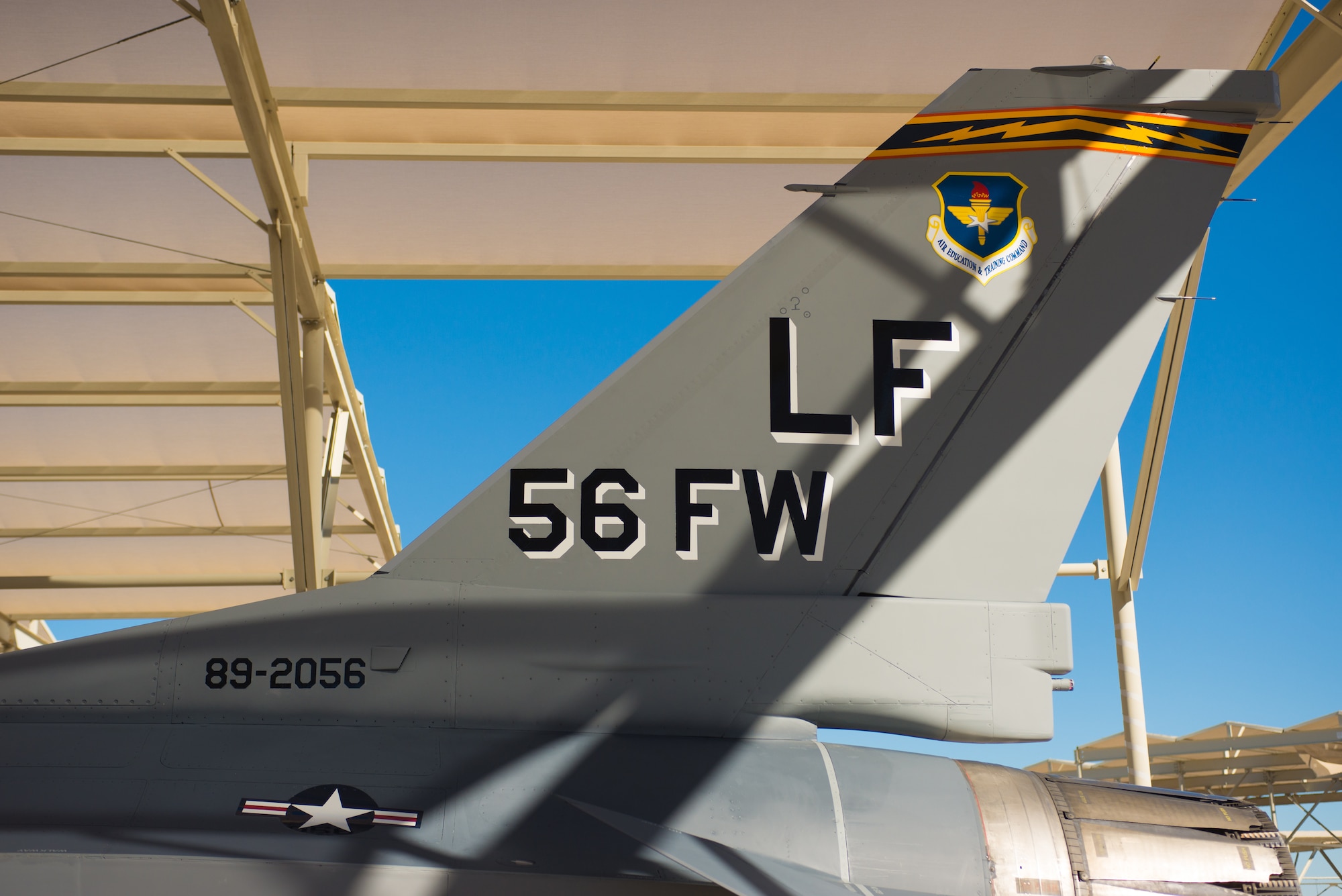 An F-16 Fighting Falcon sits on the runway with its newly painted vintage tail flash at Luke Air Force Base, Ariz. The F-16 will promote the heritage and role the aircraft has played in the Air Force and the Airmen who fly and maintain it. (U.S. Air Force photo by Senior Airman Caleb Worpel)