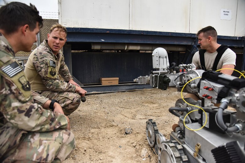 380th Expeditionary Civil Engineer Squadron Explosive Ordnance Disposal technicians participate in proficiency training at Al Dhafra Air Base, United Arab Emirates, Feb. 12, 2019. EOD Airmen are trained to detect, disarm, detonate and dispose of explosive threats all over the world. (U.S. Air Force photo by Senior Airman Mya M. Crosby)