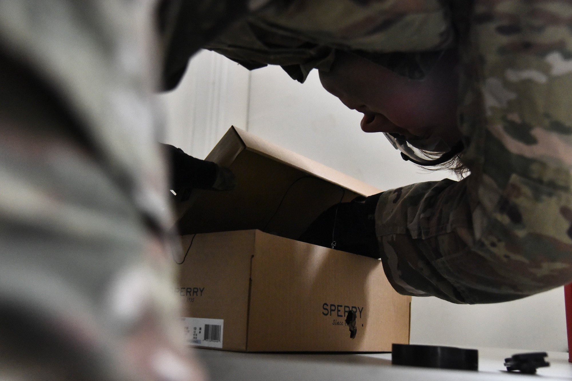 U.S. Air Force Staff Sgt. Mike Kealty, 380th Expeditionary Civil Engineer Squadron Explosive Ordnance Disposal flight EOD team member, insulates and isolates a blasting cap during proficiency training at Al Dhafra Air Base, United Arab Emirates, Feb. 12, 2019. EOD Airmen are trained to detect, disarm, detonate and dispose of explosive threats all over the world. (U.S. Air Force photo by Senior Airman Mya M. Crosby)