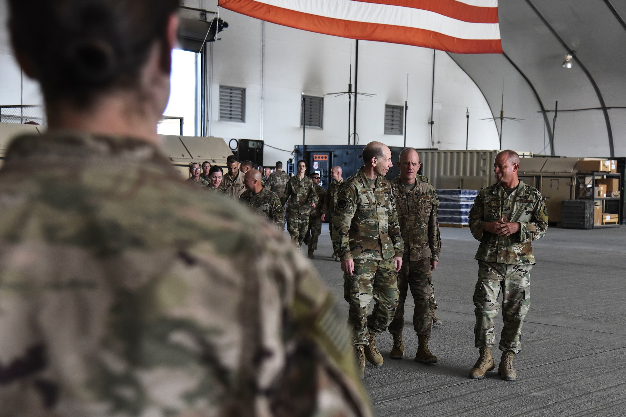 U.S. Air Force Col. James Clavenna, 380th Expeditionary Maintenance Group commander, greets Gen. Mike Holmes, commander of Air Combat Command, and Chief Master Sgt. Frank Batten III, Air Combat Command command chief, at Al Dhafra Air Base, United Arab Emirates, Feb. 14, 2019. During their visit, Holmes and Batten met and thanked Airmen for their hard work and sacrifices to protect the people back in the United States.  (U.S. Air Force photo by Senior Airman Mya M. Crosby)