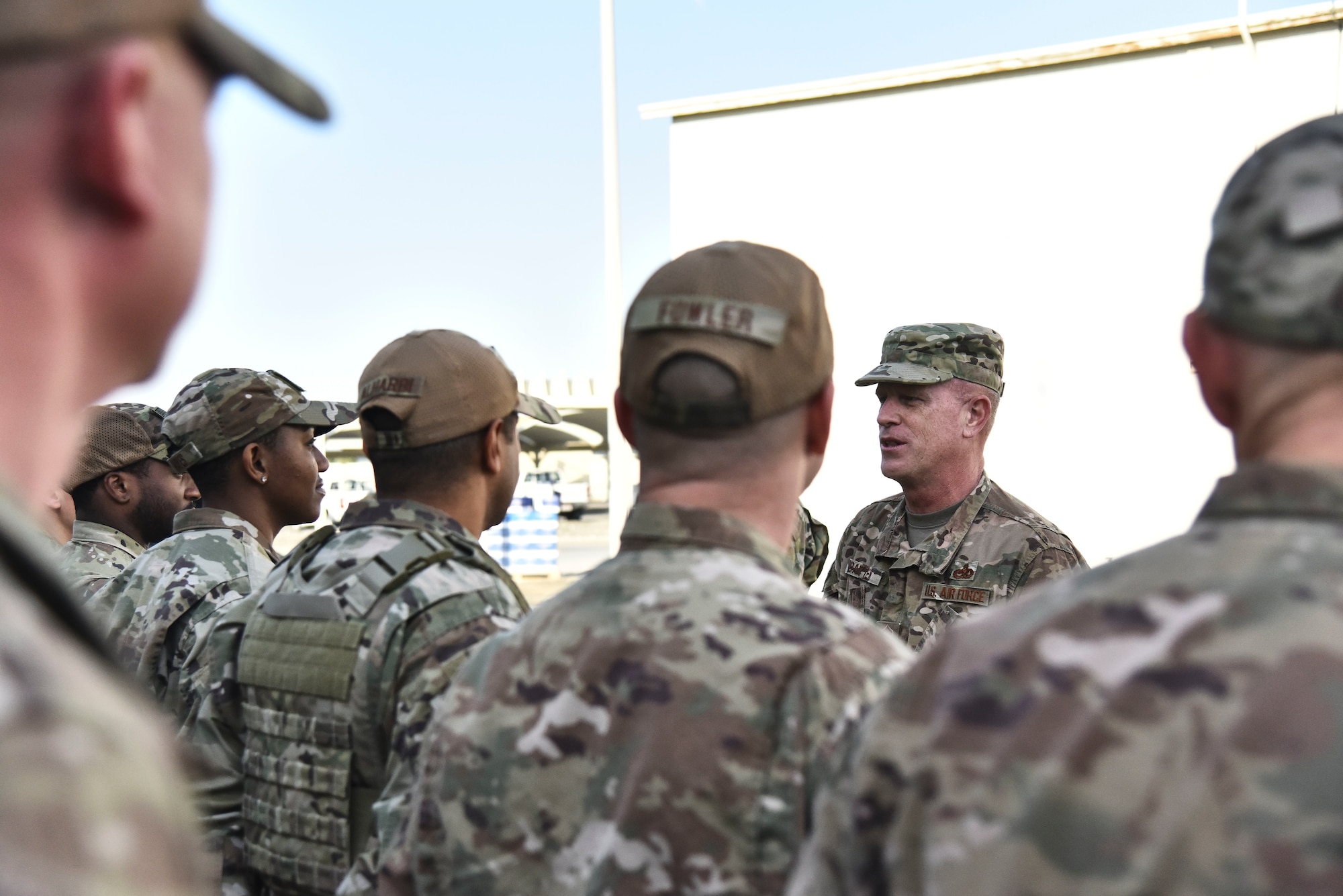 U.S. Air Force Chief Master Sgt. Frank Batten III, Air Combat Command command chief, speaks to members assigned to the 380th Expeditionary Security Forces Squadron at Al Dhafra Air Base, United Arab Emirates, Feb. 14, 2019. As command chief, Batten advises the ACC commander and staff on matters influencing the readiness, training, professional development and effective utilization of assigned personnel. (U.S. Air Force photo by Senior Airman Mya M. Crosby)