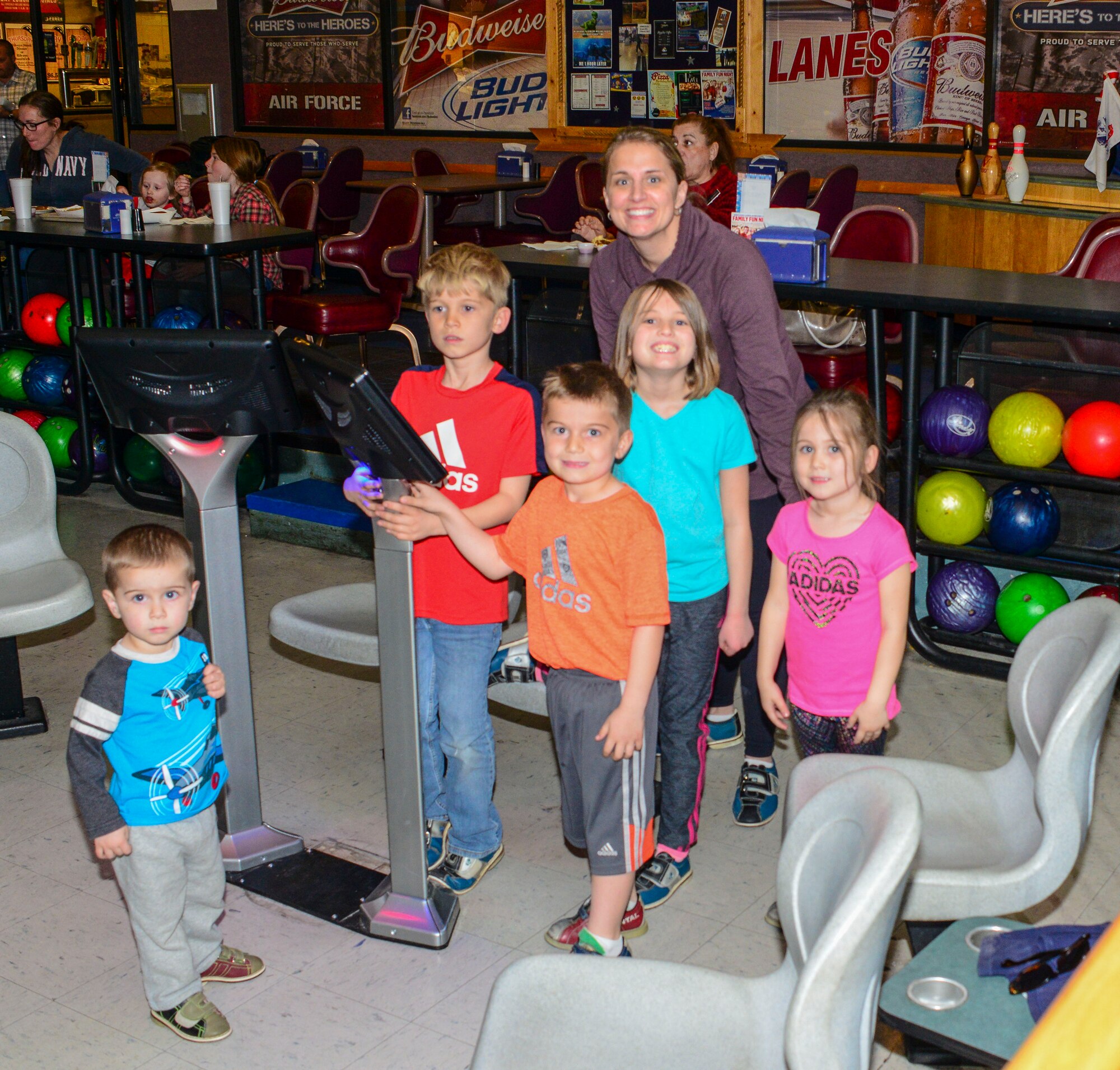 Team Turner took to the lanes at Kirtland Bowling Center Feb. 16, to take part in the Hearts Apart Bowling Extravaganza. Hearts Apart, a program run by Airman and Family Readiness to assist Team Kirtland families separated from loved ones due to deployment, holds family appreciation events throughout the year. (U.S. Air Force photo by Jim Fisher)