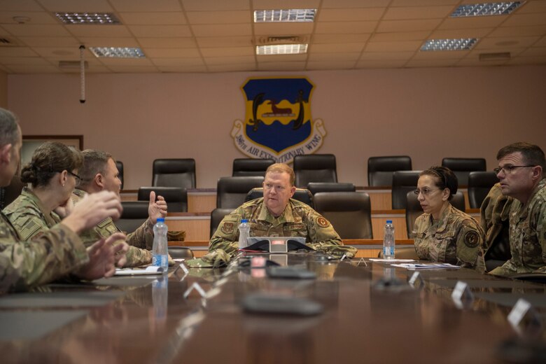Lt. Gen. Richard Scobee, Air Force Reserve commander, speaks with Col. Patrick Schlichenmeyer