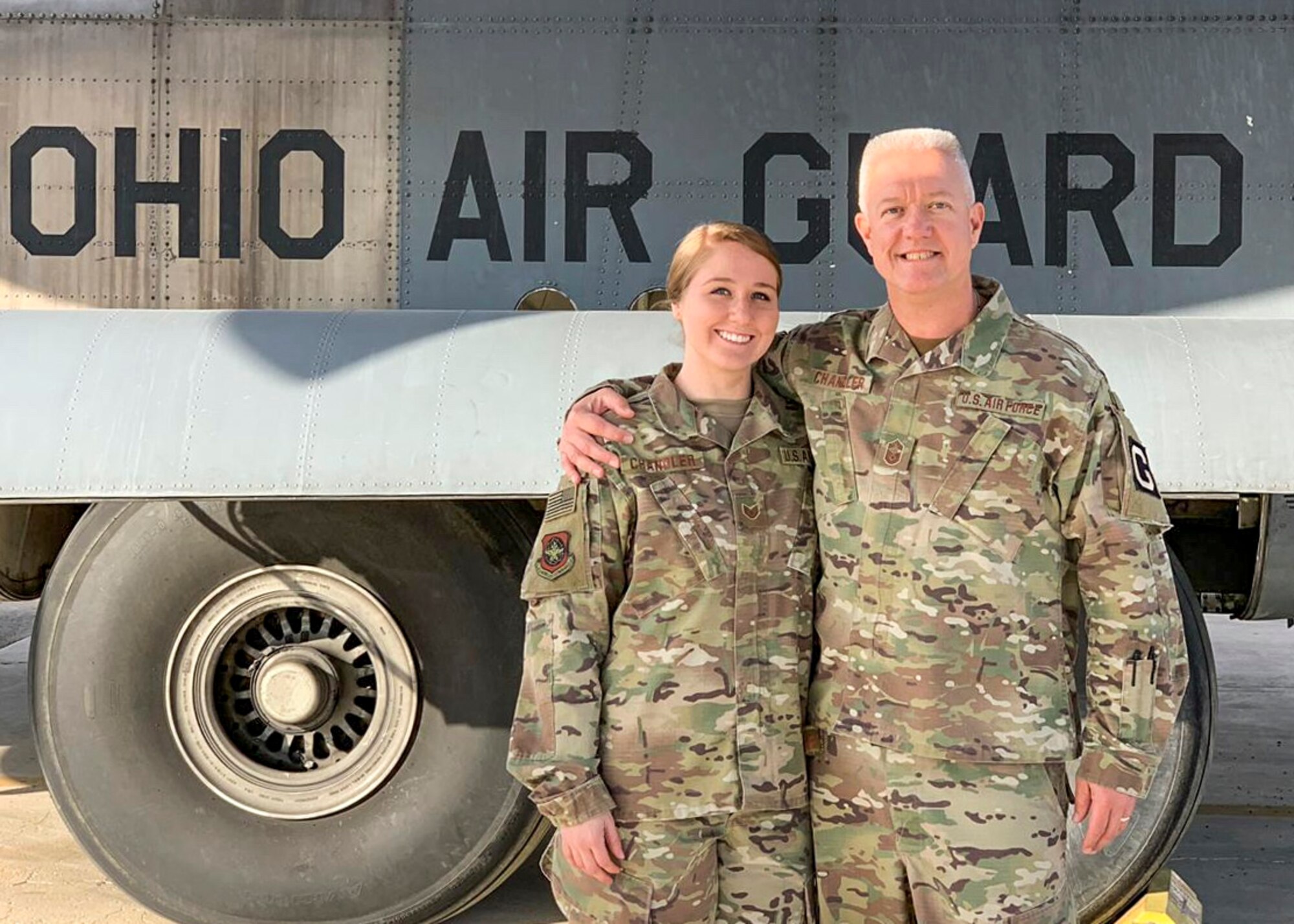 Chief Master Sgt. Ralph Chandler, 385th Aircraft Maintenance Squadron Det. 2 chief, and Staff Sgt. Madison Chandler, 779th Expeditionary Airlift Squadron aviation resource manager, pose for a photo in front of a C-130 at an undisclosed location in Southwest Asia, Feb. 18, 2019. This deployment was Madison’s first and possibly Ralph’s last, but the memories of being deployed together will last a lifetime.